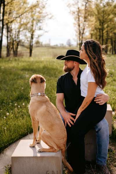 couple with dog for Chicago engagement photos