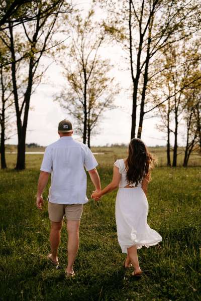 couple walking for Chicago engagement photos