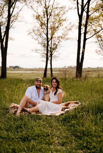 couple with dog for Chicago engagement photos