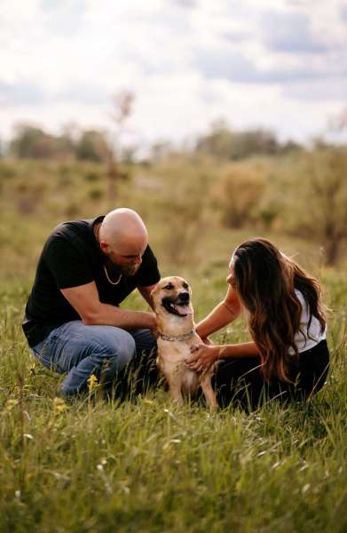 couple with dog for Chicago engagement photos