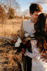 Couple posing on wedding day at Indiana Dunes.