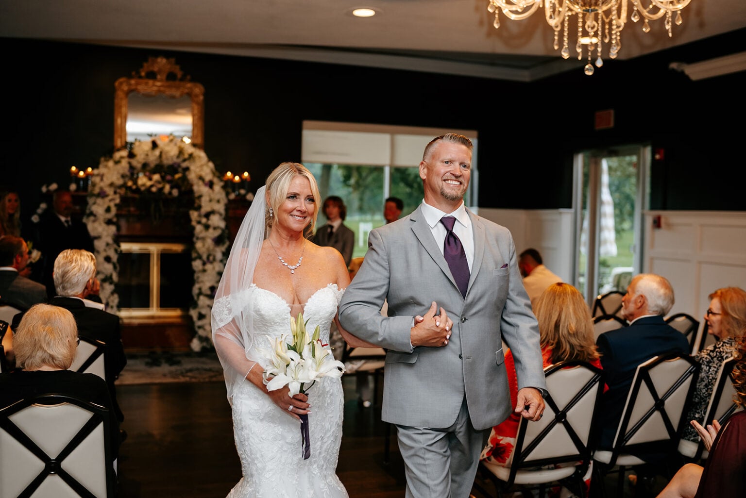 Jack and Kate walking down the aisle at Innsbrook Country Club in Merrillville Indiana